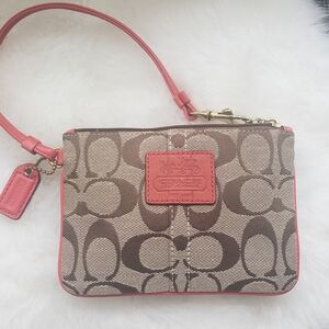 Coach Brown Signature Canvas Wristlet with Coral Pink Saddle Trim